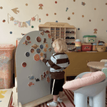 Freestanding MagPlay magnetic playwall with wooden stand